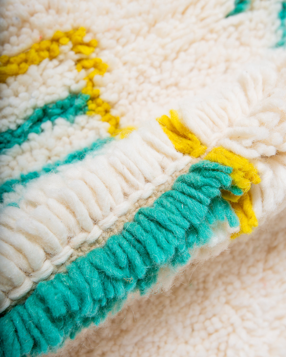 Modern, designer, handcrafted Berber rug from Morocco. Beniourain carpet with beautiful colours and patterns and fluffy wool texture.